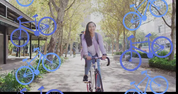 Image of purple bike icons over biracial woman on bike in city. Global connections and data processing concept digitally generated image.