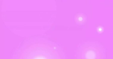 Pembe arka planda hareket eden parlak ışık lekelerinin canlandırması. Renk, şekil, ışık ve hareket konsepti dijital olarak oluşturulmuş video.