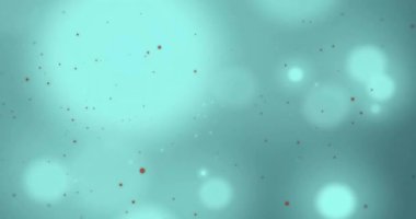 Yeşil arka planda hareket eden parlak ışık noktalarının canlandırması. Işık, renk ve hareket konsepti dijital olarak oluşturulmuş video.