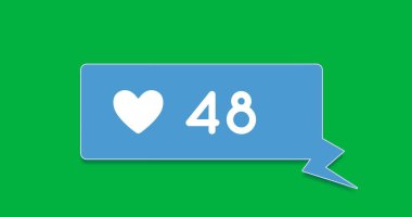 Bir kalp simgesinin dijital görüntüsü ve yeşil arkaplandaki mavi sohbet kutusunun içindeki sayılar artıyor 