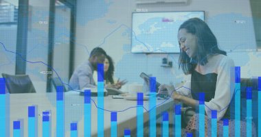 Image of financial data processing over diverse business people in office. global business, finances and digital interface concept digitally generated image.