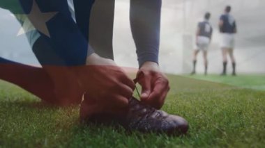 Rugby sahasında çizme bağlayan Kafkasyalı rugby oyuncusu üzerinden Şili bayrağı animasyonu. Şili, milliyet, takım, hazırlık, spor ve yarışma, dijital olarak oluşturulmuş video.