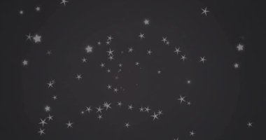 Siyah arka planda hareket eden beyaz yıldızların animasyonu. Desen ve dijital arayüz kavramı dijital olarak oluşturulmuş video.