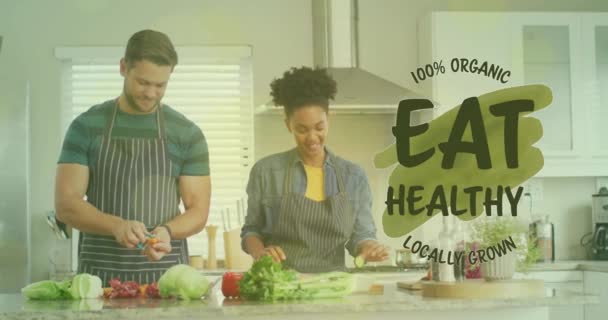 Animation Äta Hälsosam Text Över Olika Par Förbereder Hälsosam Måltid — Stockvideo