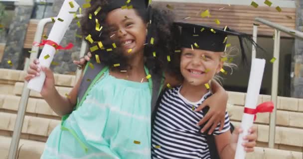 Animation Gold Confetti Happy Diverse Schoolgirls Diplomas Mortarboards Embracing Celebration — Stock Video