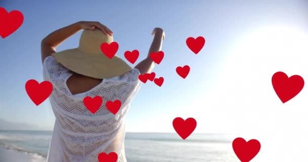 Animation Hearts Moving Biracial Woman Hat Beach Summer Love Romance — Stock Video