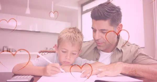 Image Hearts Falling Caucasian Man His Son Doing Homework Fashion — Stock Photo, Image