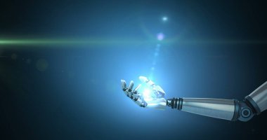 Robot el parlak ışığa doğru uzanıyor, teknolojinin gelişimini simgeliyor.. 
