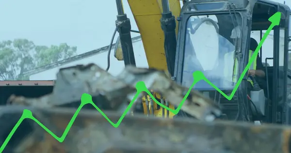 stock image Caucasian male colleague wearing safety gear, operating excavator. Concentrating on controls, he ensures precision in his movements