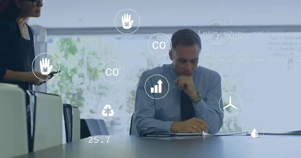 stock image Image of eco icons and data processing over diverse business people in office. Global business, finances, computing and data processing concept digitally generated image.