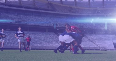 Spor stadyumundaki çeşitli rugby oyuncularının üzerinde parlayan ışıklar. ragbi, takım çalışması, spor ve yarışma konsepti dijital olarak oluşturulmuş imaj.