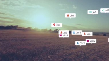 Gün batımında kırsal alanda sosyal medya animasyonları. Uyarı, bağlantı, dijital, teknoloji, etkileşim, iletişim