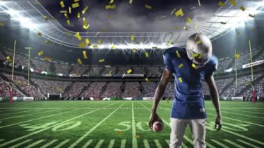 Afrika kökenli Amerikan futbolcusunun üzerine düşen konfeti animasyonu. Spor, rekabet, kazanma ve kutlama konsepti dijital olarak oluşturulmuş video.