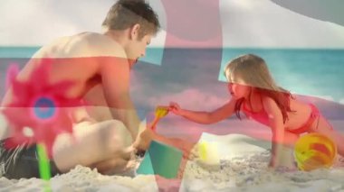 İngiliz bayrağının, beyaz babaya ve plajda oynayan çocuklara karşı canlandırması. Vatanseverlik, aile ve dijital arayüz kavramı dijital olarak oluşturulmuş video.