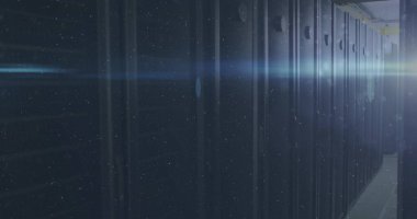 Image of light spots over server room. Global business and digital interface concept digitally generated image.