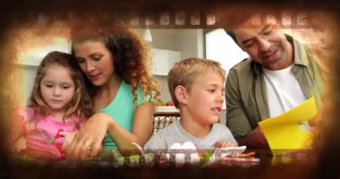 Çocuklarla el işi yapmak, aile evde birlikte film şeridi animasyonu yaratmak. yaratıcılık, bağ, çocuklar, DIY, takım çalışması, ev aktiviteleri