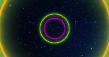 Mavi noktaların üzerinde hareket eden neon halkaların animasyonu. Teknoloji, renkler ve dijital arayüz konsepti, dijital olarak oluşturulmuş video.