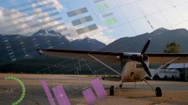 Dağ pistindeki küçük uçağın üzerinde çizimler ve grafikler. veri, iş, finans