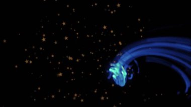 Siyah arka planda altın yıldızlı mavi ve yeşil kıvrımlı animasyonlar. Özet, hareket, döngü, dijital, dinamik, canlı