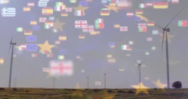 Rüzgâr türbinleri dalgalı uluslararası bayrak animasyonlarıyla birlikte sahada. Yenilenebilir, rüzgar enerjisi, sürdürülebilirlik, çevre, güç, küresel
