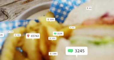 Sosyal medya etkileşimi sandviç ve patates kızartması üzerine animasyon simgeleri oluşturuyor. Gıda, fast food, iletişim, dijital, teknoloji, canlı