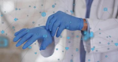 Doktor eldiven takıyor ve animasyon üzerinde tıbbi ikonlar ve ağ bağlantıları var. Sağlık, teknoloji, yenilik, fütürist, tıp, dijital