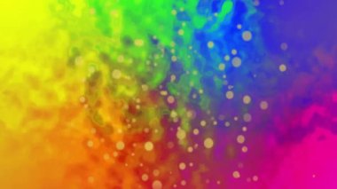 Gökkuşağı gradyanı ve parlayan parçacıkları olan renkli soyut animasyon. canlı, arkaplan, dijital, dinamik, ışık, hareket