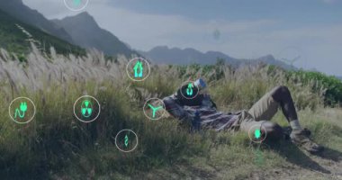 Yenilenebilir enerji ve sürdürülebilirlik, doğada dinlenen insan üzerinde canlandırma simgeleri oluşturur. sürdürülebilir, ekoloji, çevre, yeşil, gevşeme, koruma