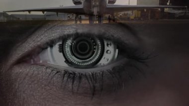 Uçağın iniş hareketlerini gözbebeğiyle kusursuz bir şekilde harmanladığını gösteren yakın plan görüntüler. Gerçeküstü, teknoloji, havacılık, gelecekçi, yenilik, melez