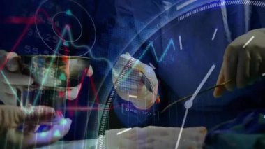 Cerrahlar tıbbi veriler ve grafiklerle ameliyat yapıyorlar. Cerrahi, sağlık, teknoloji, yenilik
