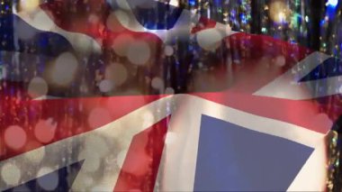 Bokeh ışıklı Union Jack bayrağı silueti üzerinde animasyon. Vatanseverlik, kutlama, ulusal, İngiltere, şenlik