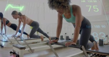 Reformist makineler üzerinde egzersiz yapan kadınların kalp atış hızı ve form verileri. Egzersiz, sağlık, pilates, spor, egzersiz, teknoloji