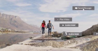 El ele tutuşan ve deniz kenarında yürüyen bir çiftin sosyal medya bildirimleri. Bağlantı, teknoloji, aşk, ilişki, birliktelik, dijital