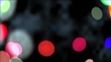 Wow metin animasyonu koyu arkaplandaki bulanık renkli ışıkların üzerinde. tipografi, dijital, canlı, neon, parlayan, hareket