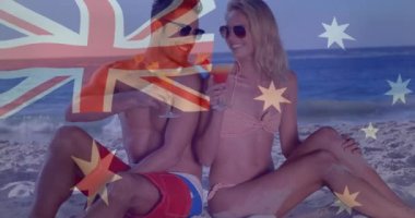 Avustralya bayrağı animasyonu plajda kokteyllerle dinlenen bir çiftin üzerine. Seyahat, tatil, rahatlama, gün batımı, boş zaman, yaşam tarzı