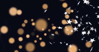 Koyu arkaplanda altın bokeh ışıkları ve gümüş yıldız animasyonu. Parıltı, ışıltı, şenlik, aydınlık, kutlama, soyut