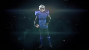 Amerikalı futbolcu topu tutuyor, dijital animasyon arka planında güvenle duruyor. Spor, atlet, yarışma, aksiyon, hareket, güç