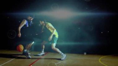 Basketbol oynayan iki sporcu, dinamik ışık çizgileri üzerinden hareket halindedir. rekabet, spor, takım, enerji, hareket, performans