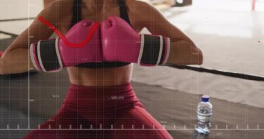 Boksör, egzersiz sahnesinde finansal veri animasyonuyla birlikte pembe eldiven eğitimi alıyor. Boks, fitness, atlet, spor, egzersiz, üst üste bindirme