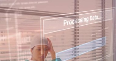 Hastanedeki yorgun sağlık çalışanı üzerinden veri işleme ve animasyon yükleme. Tıbbi, stres, veri analizi, teknoloji, yorgunluk, hemşire