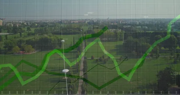 stock image Image of statistical data processing against aerial view of grassland. Global business data technology concept