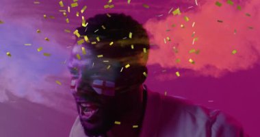 Afro-Amerikan erkek destekçisi ve İngiltere bayrakları üzerinde konfeti animasyonu. Spor ve dijital arayüz konsepti dijital olarak oluşturulmuş video.