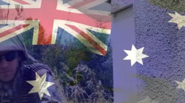 Çeşitli askerler üzerinde Avustralya bayrağının animasyonu. Vatanseverlik, silahlı kuvvetler, savunma ve savaş konsepti dijital olarak oluşturulmuş video.