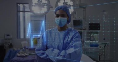 Ameliyathanede çift ırklı kadın cerrahın kardiyografisinin canlandırılması. Teknoloji, tıp ve dijital arayüz kavramı dijital olarak oluşturulmuş video.