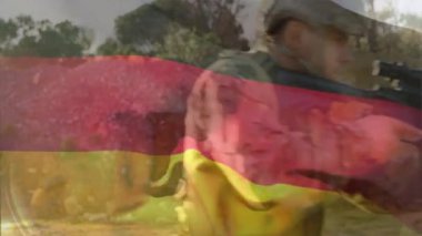 Çeşitli askerler üzerinde Alman bayrağının animasyonu. Vatanseverlik, silahlı kuvvetler, savunma ve savaş konsepti dijital olarak oluşturulmuş video.