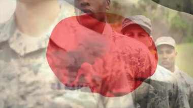 Çeşitli askerler üzerinde Japon bayrağının animasyonu. Vatanseverlik, silahlı kuvvetler, savunma ve savaş konsepti dijital olarak oluşturulmuş video.