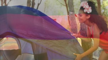 Almanya, ormanda çadır kuran insanların bayrak animasyonu. kamp, açık hava, doğa, takım çalışması, macera, kutlama