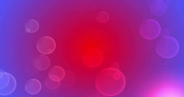 Mor arkaplanda hareket eden parlak ışık lekelerinin canlandırması. Renk, şekil, ışık ve hareket konsepti dijital olarak oluşturulmuş video.