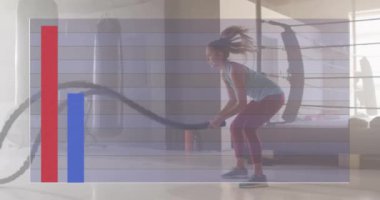 Spor salonunda iplerle egzersiz yapan Kafkas sporcu kadının diyagramlarının animasyonu. Teknoloji, spor ve dijital arayüz kavramı dijital olarak oluşturulmuş video.