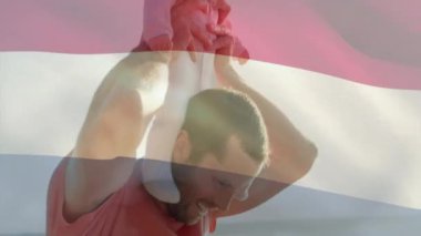 Beyaz bir babanın bebeği taşıması üzerine Hollanda bayrağının animasyonu. Yaşam tarzı, bayraklar ve vatanseverlik konsepti dijital olarak oluşturulmuş video.